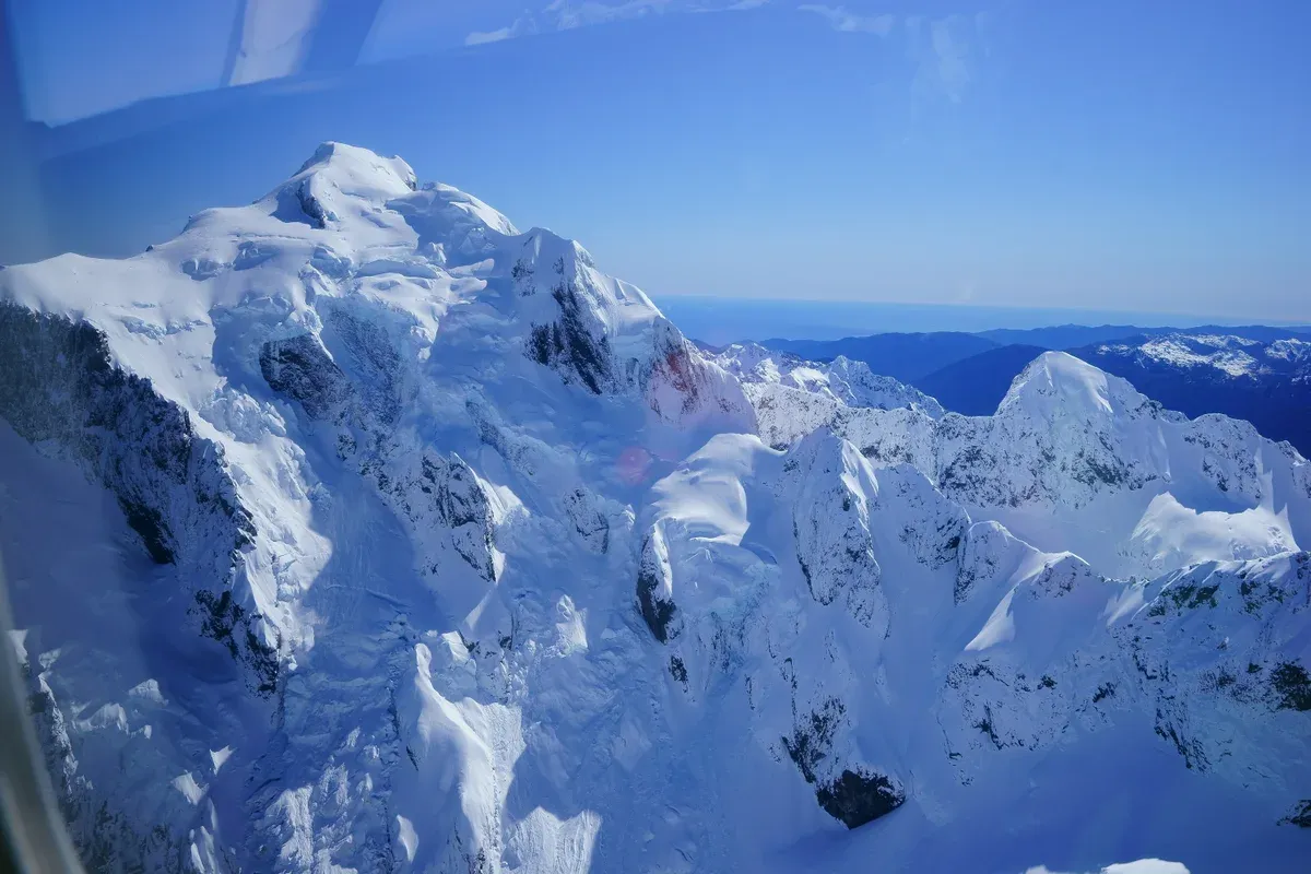 Aerial view of snow-covered Mount Tutoko in Fiordland, the kind of scenery seen on a Milford Sound scenic flight