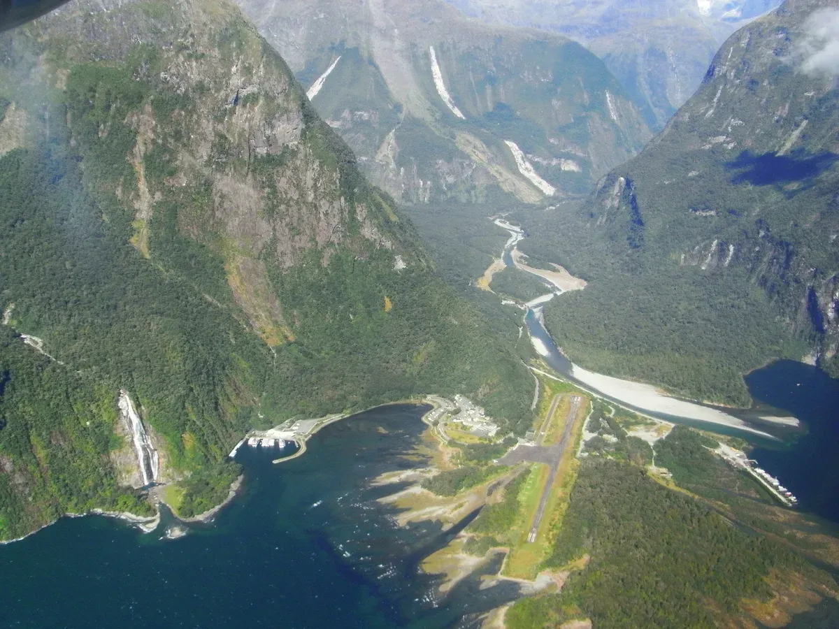 Milford Sound Airport and the fiord seen from an aircraft on a fly and Milford Sound cruise